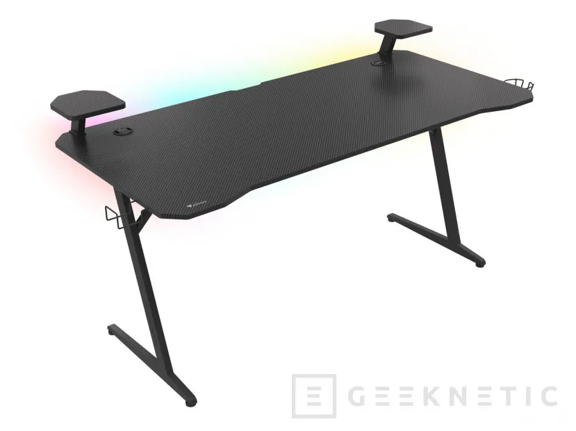 Geeknetic La mesa gaming Genesis HOLM 510 RGB llega con carga inalámbrica, hub USB 3.0 y un espacio de 160x75 cm 1
